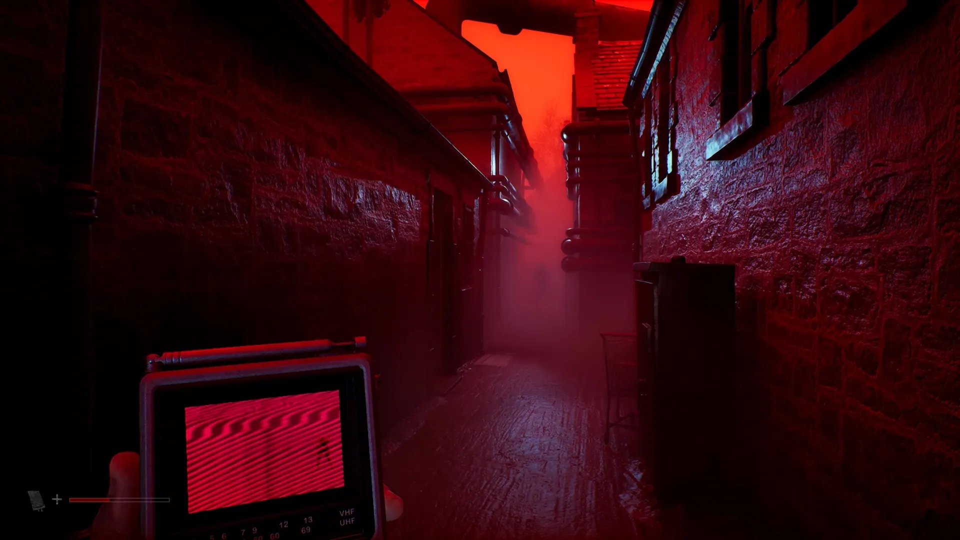 Simon looks at an enemy outline on his CRTV in Silent Hill Townfall