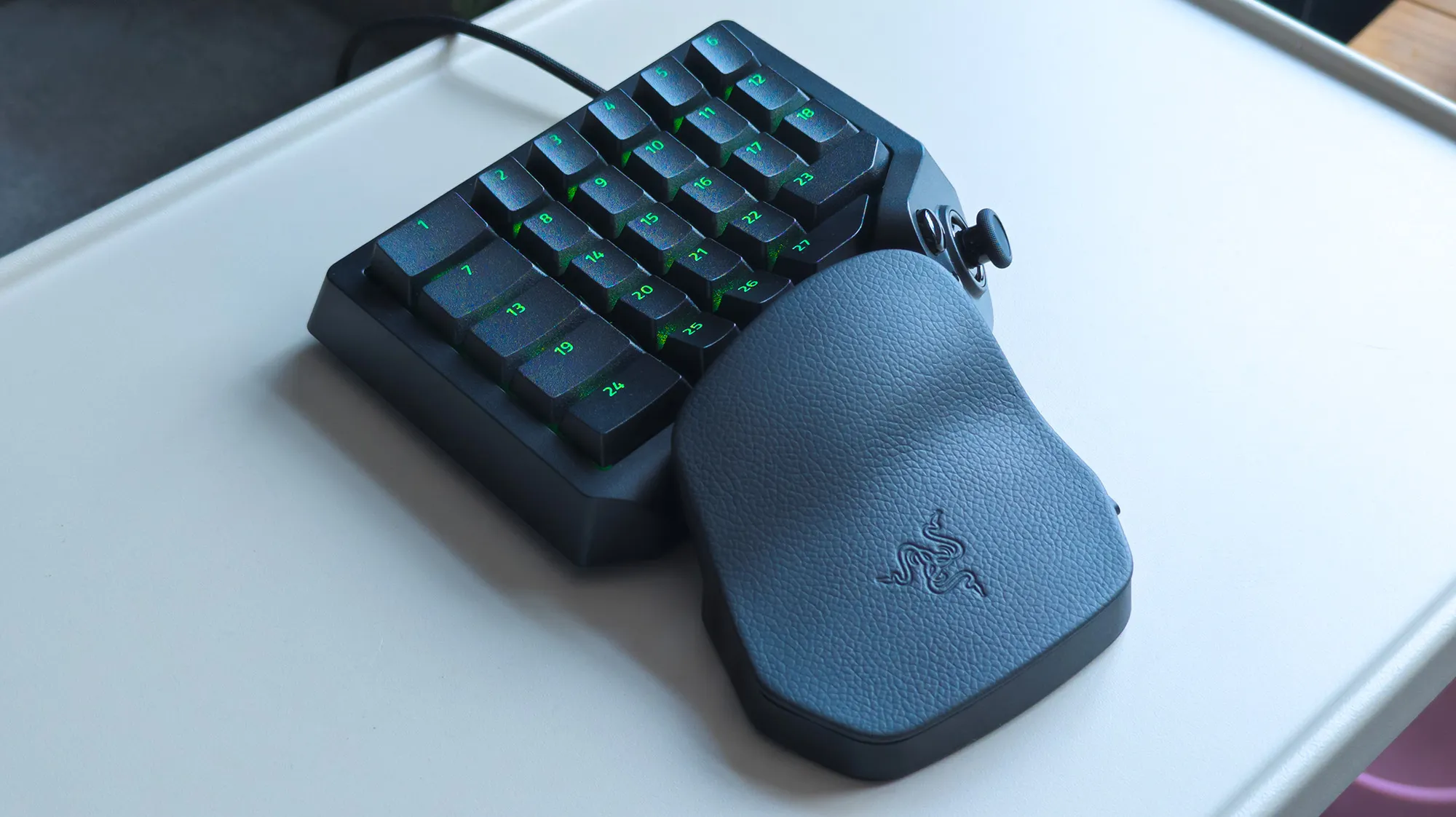 Razer Tartarus V2 Pro connected with cable to show illuminated green keys