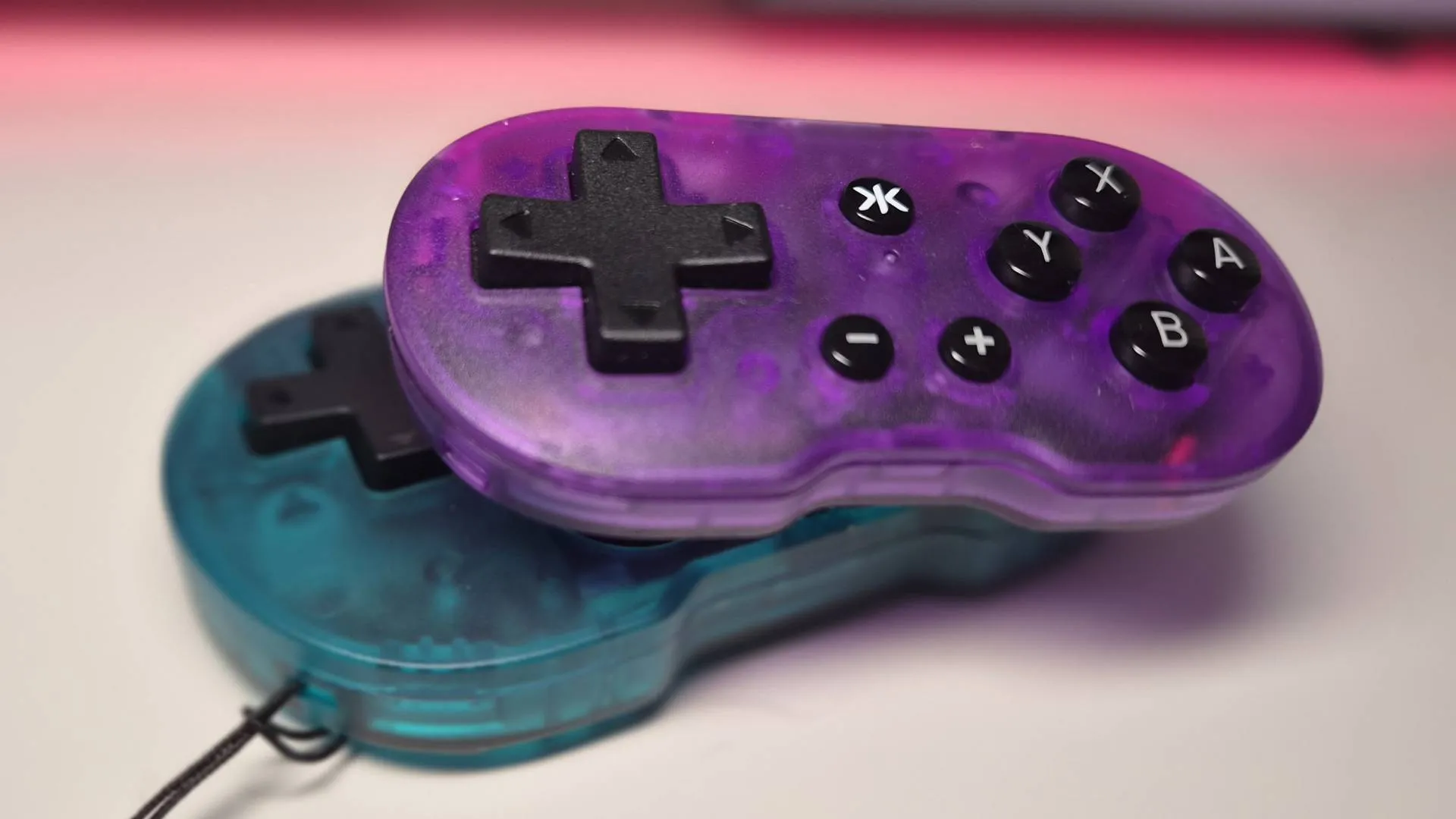 Photo of the CRKD Atom sitting on the Atom+ controller.