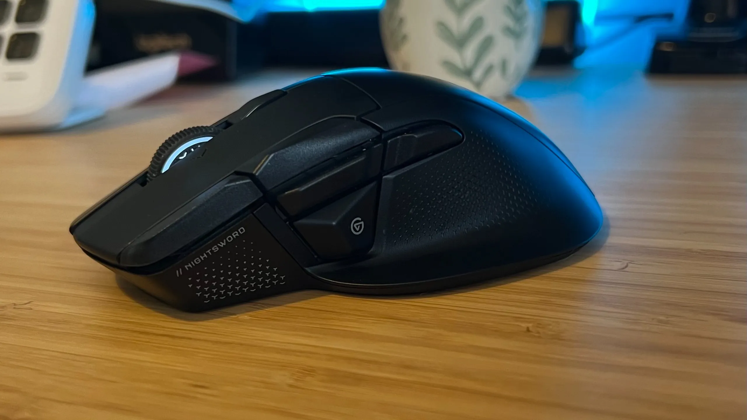 Left side of Corsair Nightsword V2 Wireless gaming mouse showing Stream Deck button and side buttons