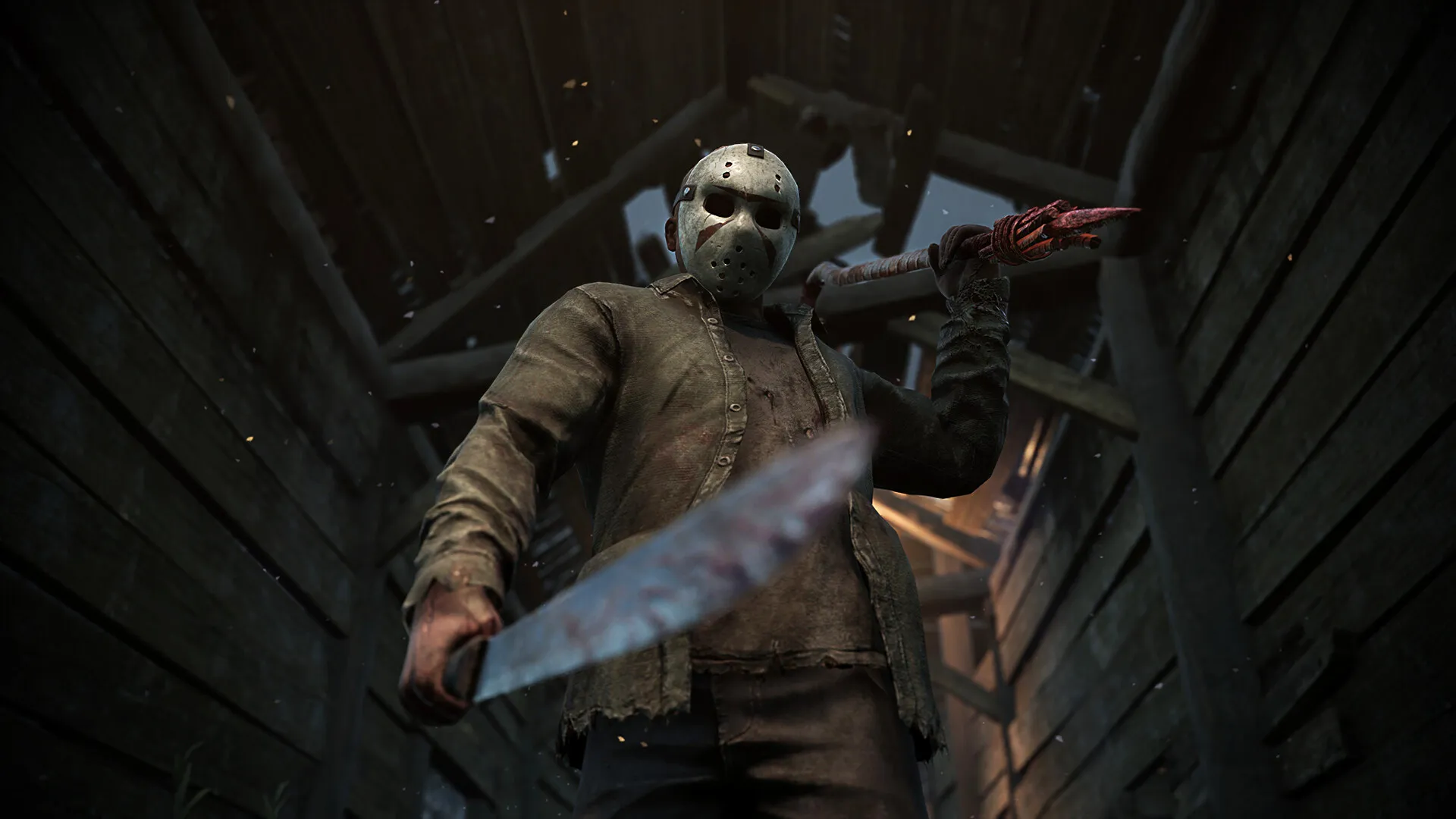 A hulking masked killer looms in a dark wooden shed, gripping a bloodied machete and raising a clawed hand; the low-angle view feels menacing and tense.